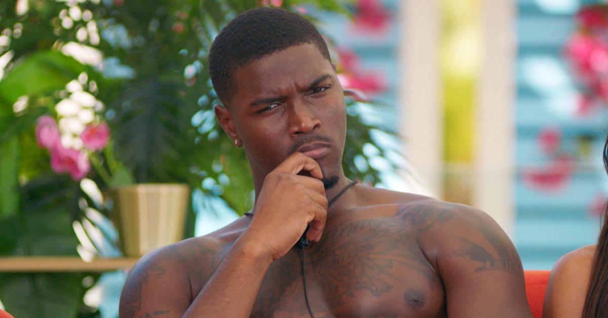 Demari looks confused while sitting at the cabana in Season 6 of ‘Too Hot to Handle.’