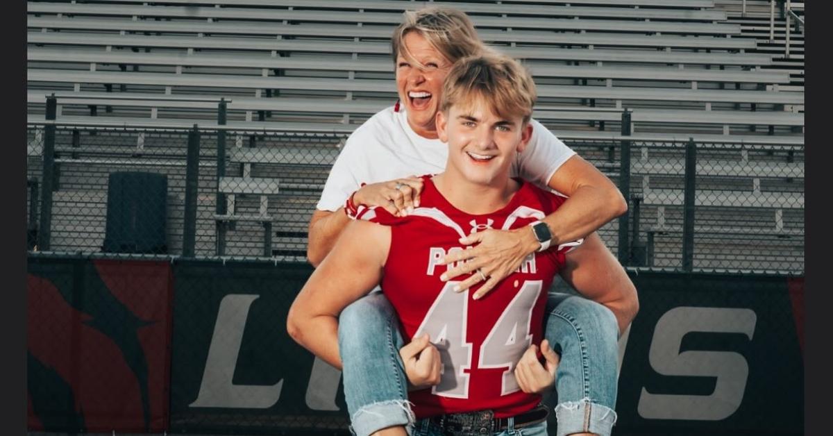 Caleb Nowicki with his mom on his back.