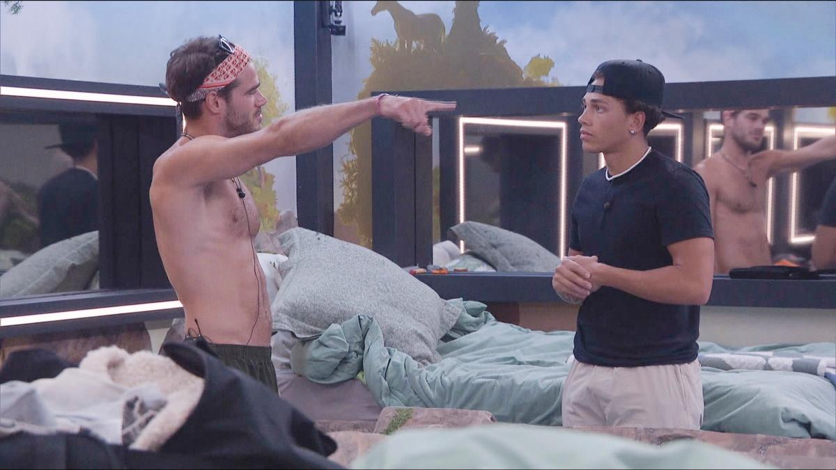 Tucker and Cedric have a discussion in a bedroom on Big Brother