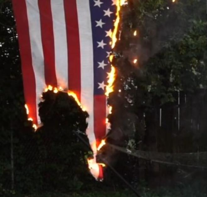 TikTok user @julieburrito burns an American flag in protest