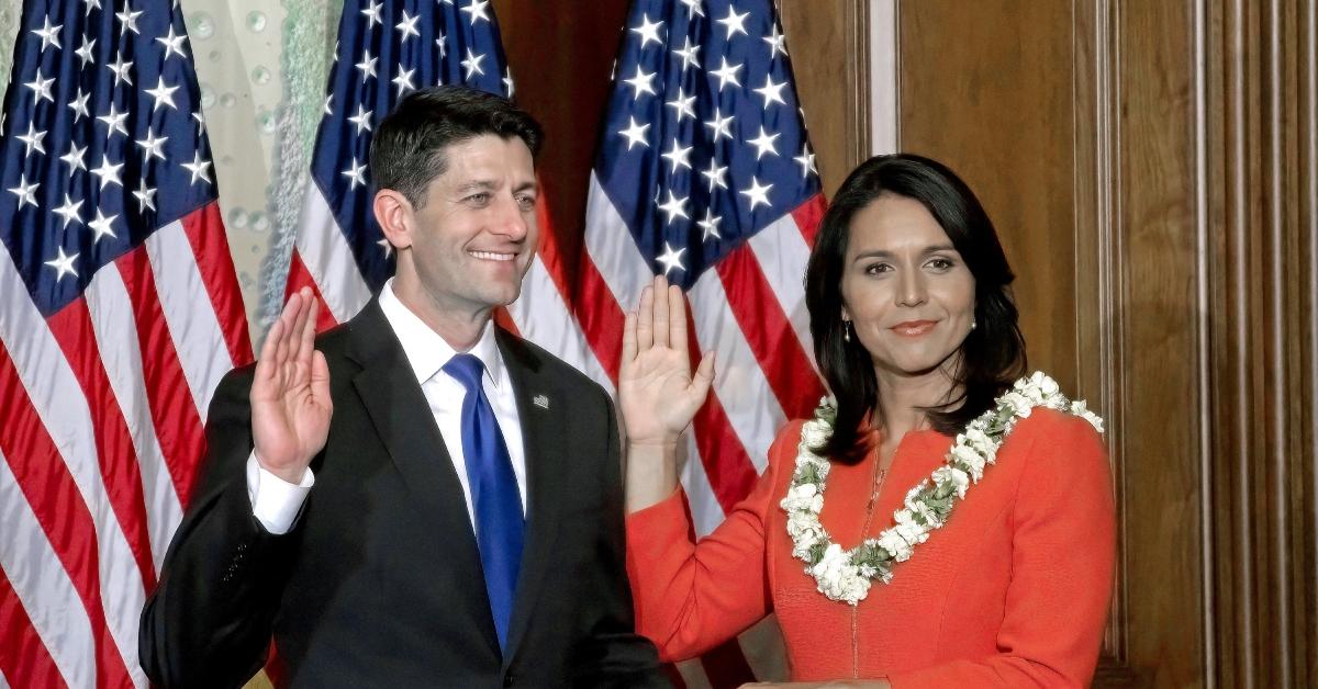 (l-r): Speaker the House Paul Ryan delivers the oath of office to Congresswoman Tulsi Gabbard  (D-HI) as part of the ceremonies on opening day of the 115th session of congress