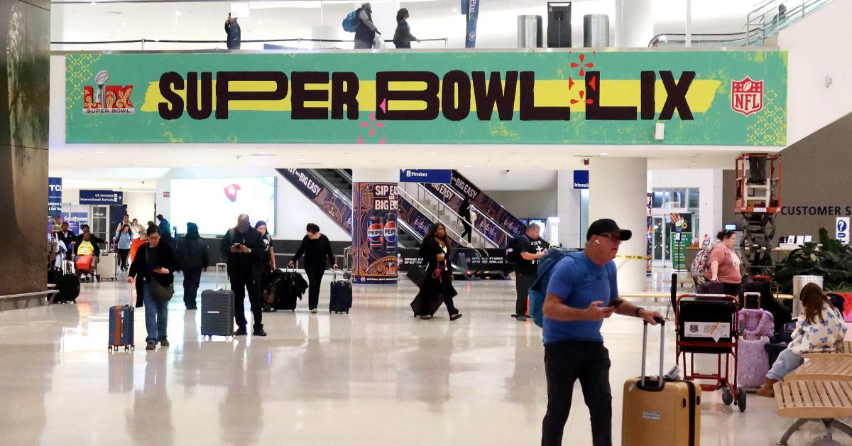 Super Bowl LIX banner is displayed at Louis Armstrong New Orleans International Airport.