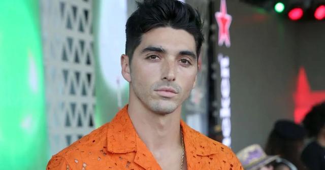 Taylor Zakhar Perez in an orange shirt.