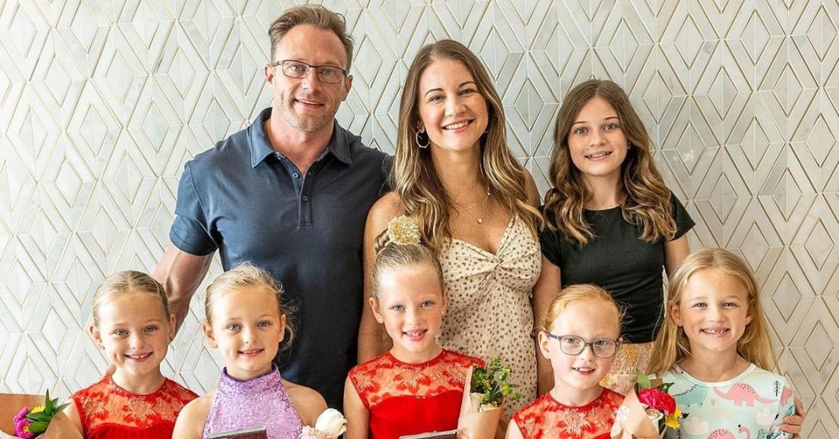 The Busby family from TLC's 'OutDaughtered' pose for a family photo at a recital.