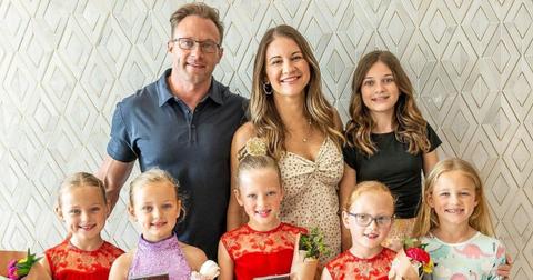 The Busby family from TLC's 'OutDaughtered' pose for a family photo at a recital.