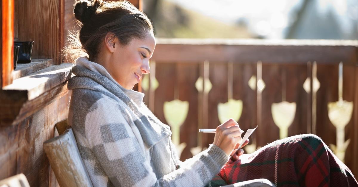 woman writing something down