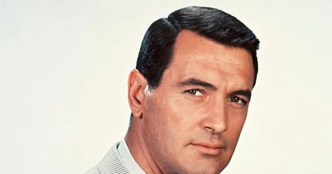 Rock Hudson wearing a striped suit in 1960.