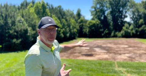 David 'Ace' Cannon talking outside in a hat.