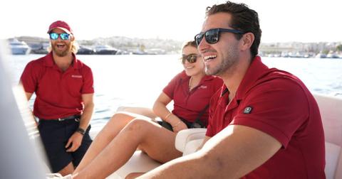 Iain McLean, Bri Muller and Joe Bradley on the deck of the Mustique