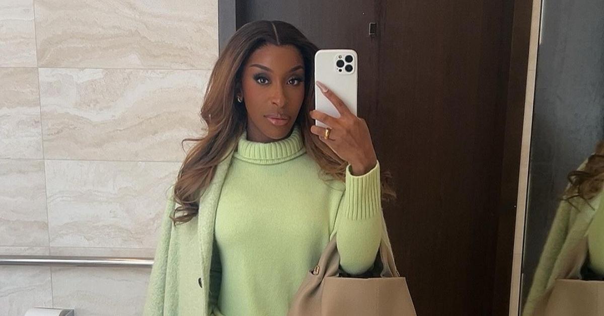 Jackie Aina posing in a selfie