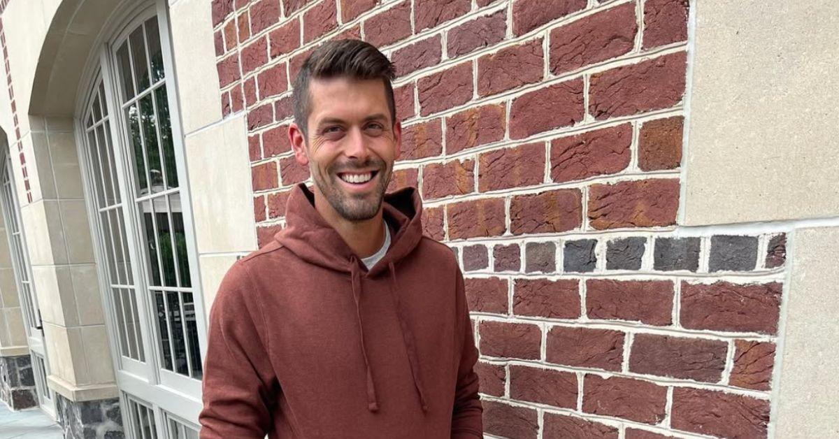 Justin Tucker against a brick wall. 