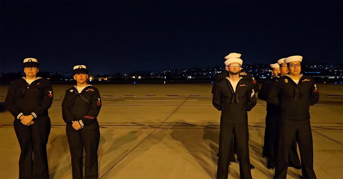 Navy sailors standing at attention. 