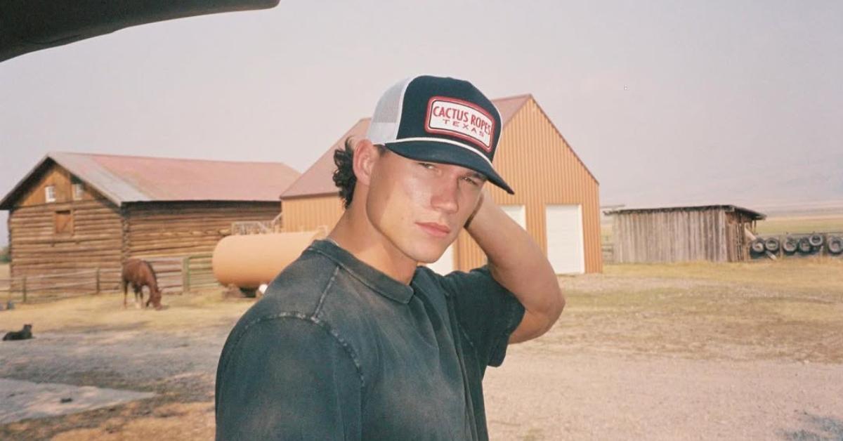 Mark Estes posing outside
