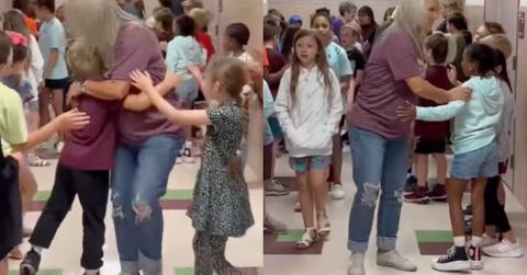 teacher hugs white student but not black student