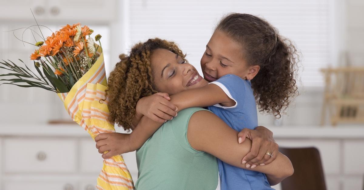 Mother and daughter hugging on Mother's Day.