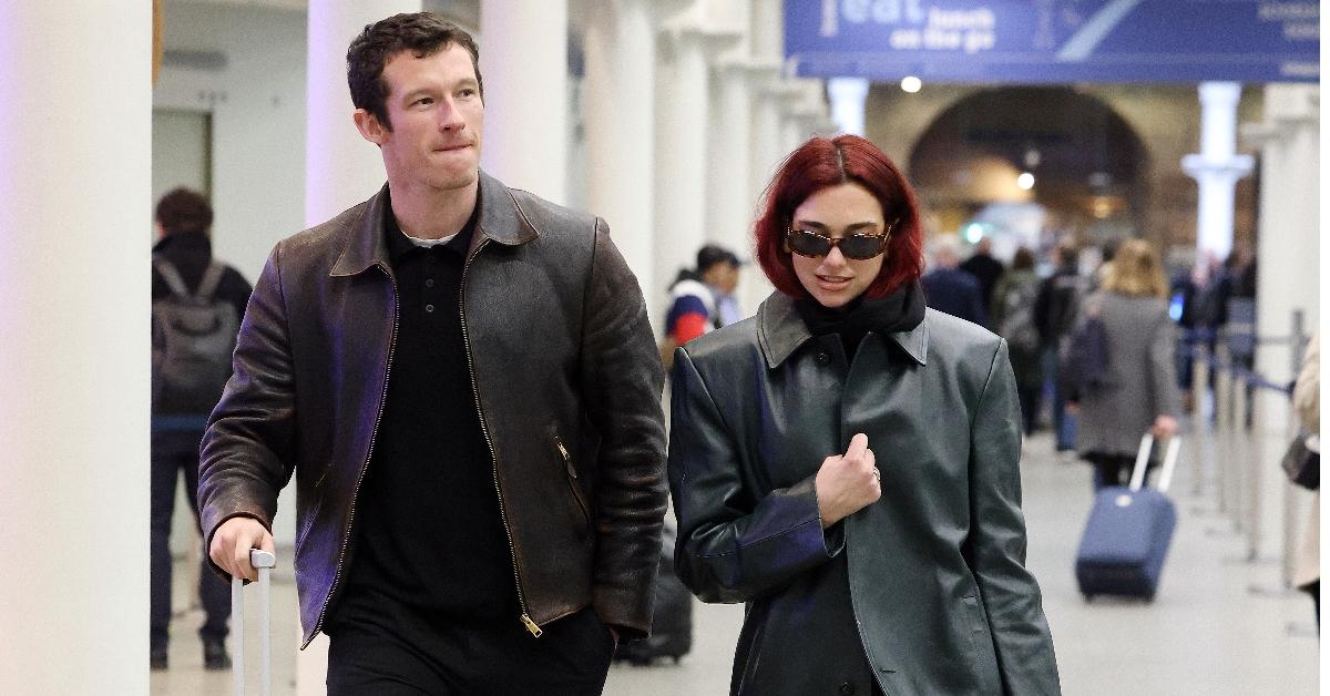 Dua Lipa and Callum Turner arriving at London St Pancras Station after taking the Eurostar from Paris on March 26, 2024 in London, England. (Photo by Neil Mockford/GC Images)