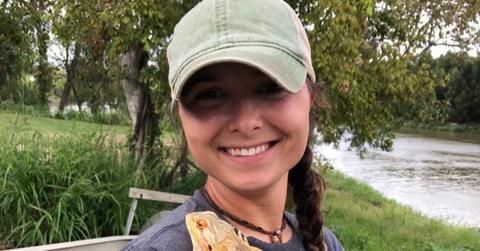 Pickle Wheat from 'Swamp People' holding a lizard.