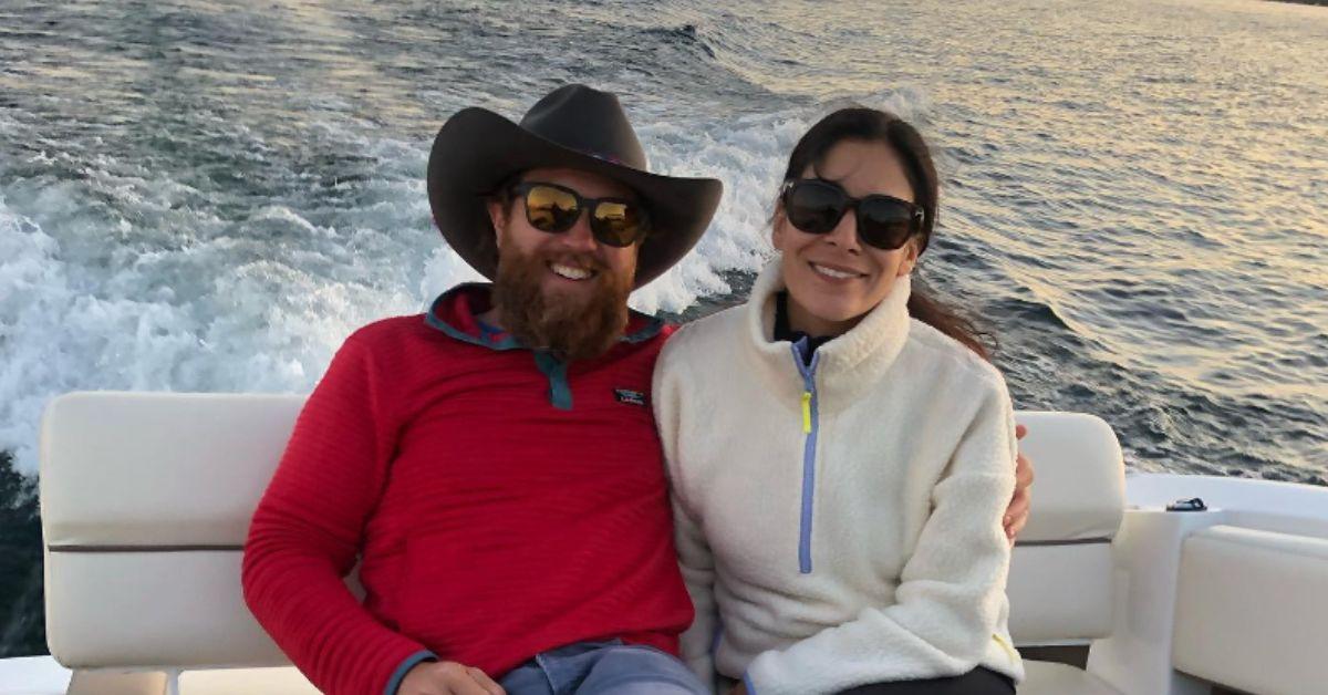 Donovan Eckhardt poses on a boat with his wife, Erica Eckhardt