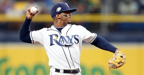 Tampa Bay Rays Shortstop Wander Franco (5) throws the ball over to first base during the MLB regular season game between the Cleveland Guardians and the Tampa Bay Rays on August 12, 2023, at Tropicana Field in St. Petersburg, FL. (Photo by Cliff Welch/Icon Sportswire via Getty Images)