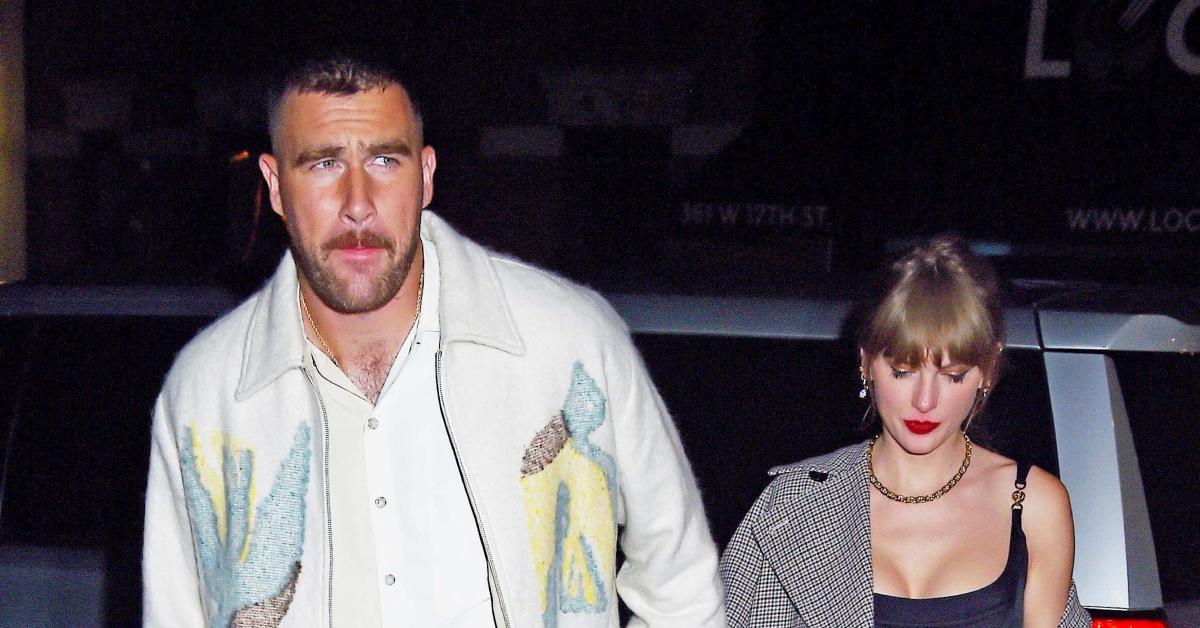 (l-r): Travis Kelce and Taylor Swift walking outside
