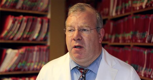 Ramin Oskoui in a white coat.