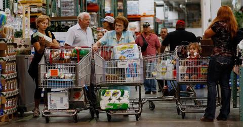 People fill up their shopping carts at Costco