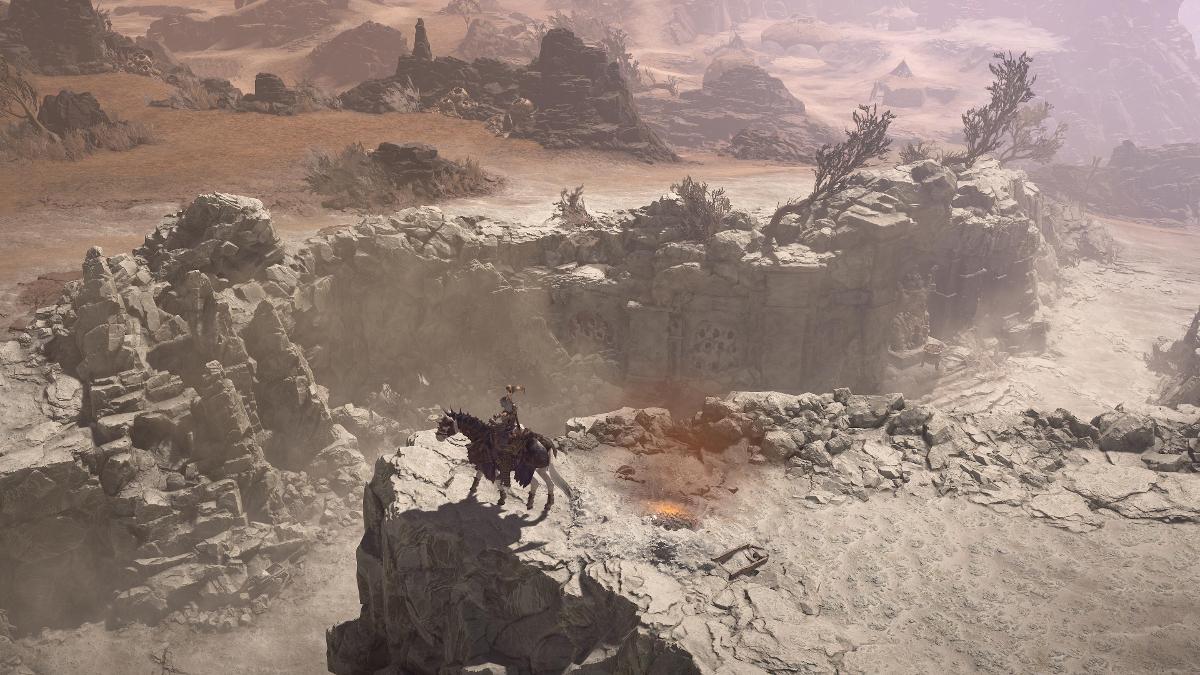 'Diablo IV' Player riding a horse through a rocky terrain.