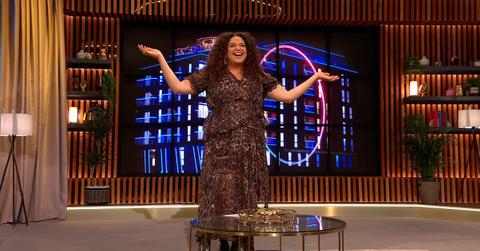 Michelle Buteau stands on the set of The Circle finale
