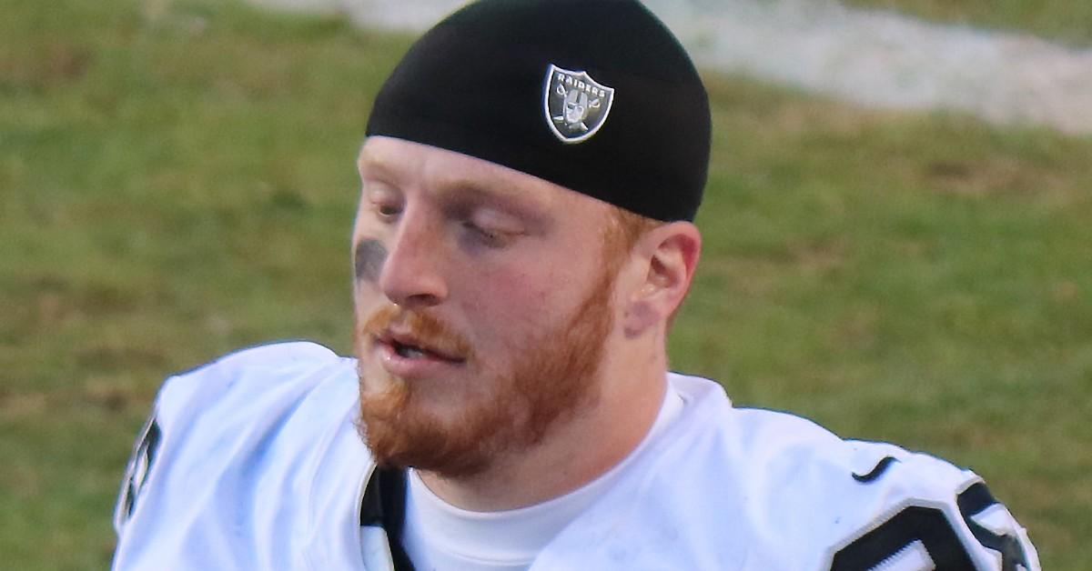 Maxx Crosby running across the field