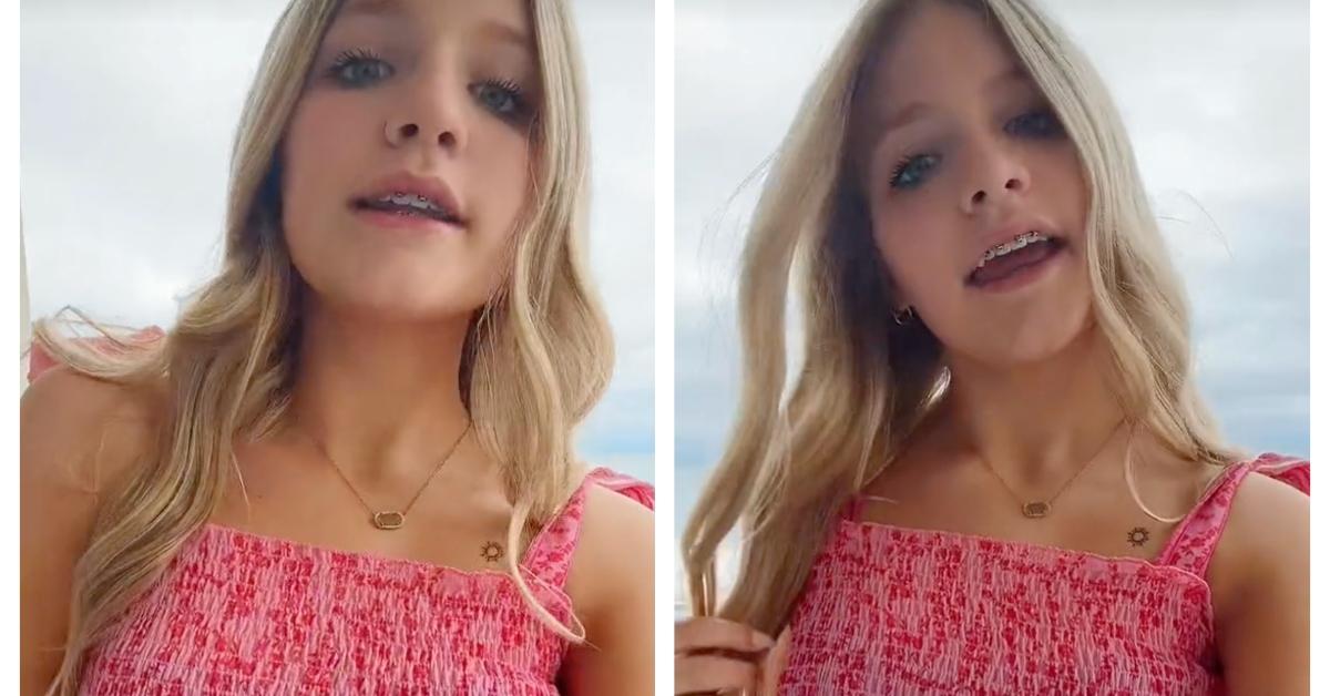 Aubreigh Wyatt in pink shirt lip-synching in a TikTok video