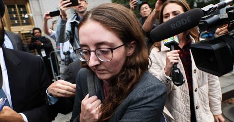 Caroline Ellison in leaving court in 2023