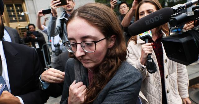 Caroline Ellison in leaving court in 2023