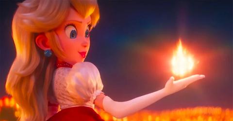 Princess Peach holding a fireball.