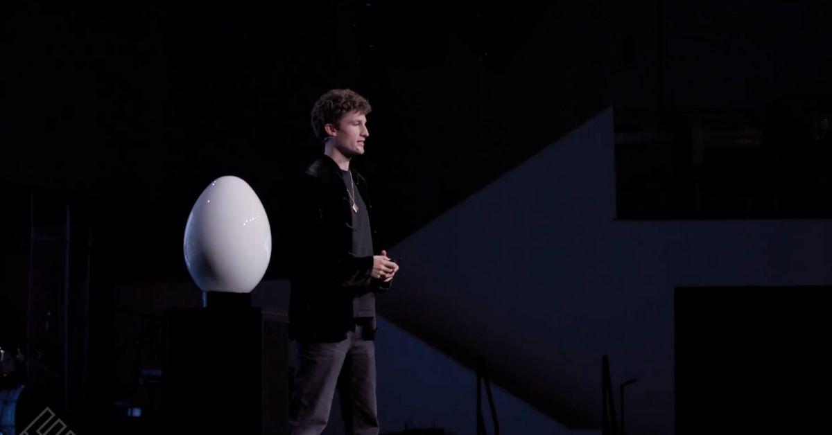 Connor Gaydos presenting the Enron Egg. 