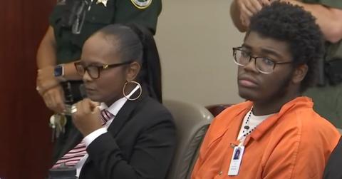 Brendan Depa sits in court with his attorney