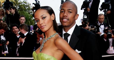 Selita Ebanks and Nick Cannon pose on the red carpet together at the "Promise Me This" film premiere during the 60th International Cannes Film Festival on May 26, 2007.