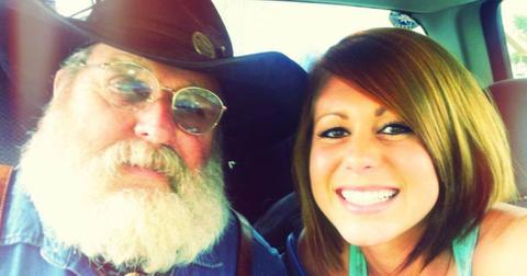 Katie Ball smiles next to Jerry Campbell