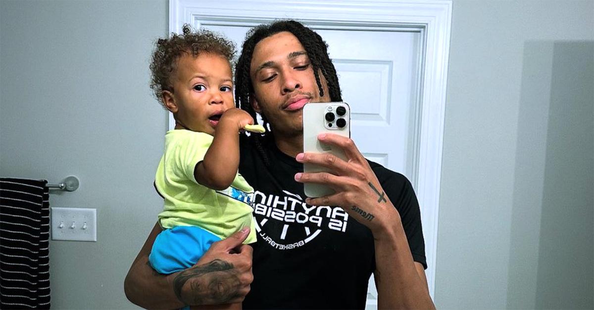 R.J. Hampton with his son Halo in his arms. 