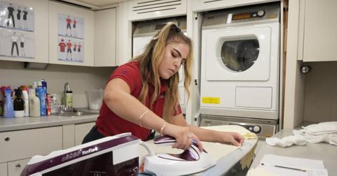 Sabrina Muller irons in laundry area on 'Below Deck Med'