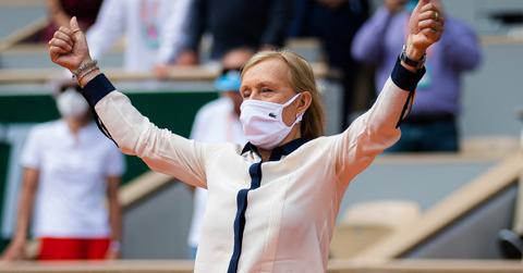 Martina Navratilova celebrating in a mask