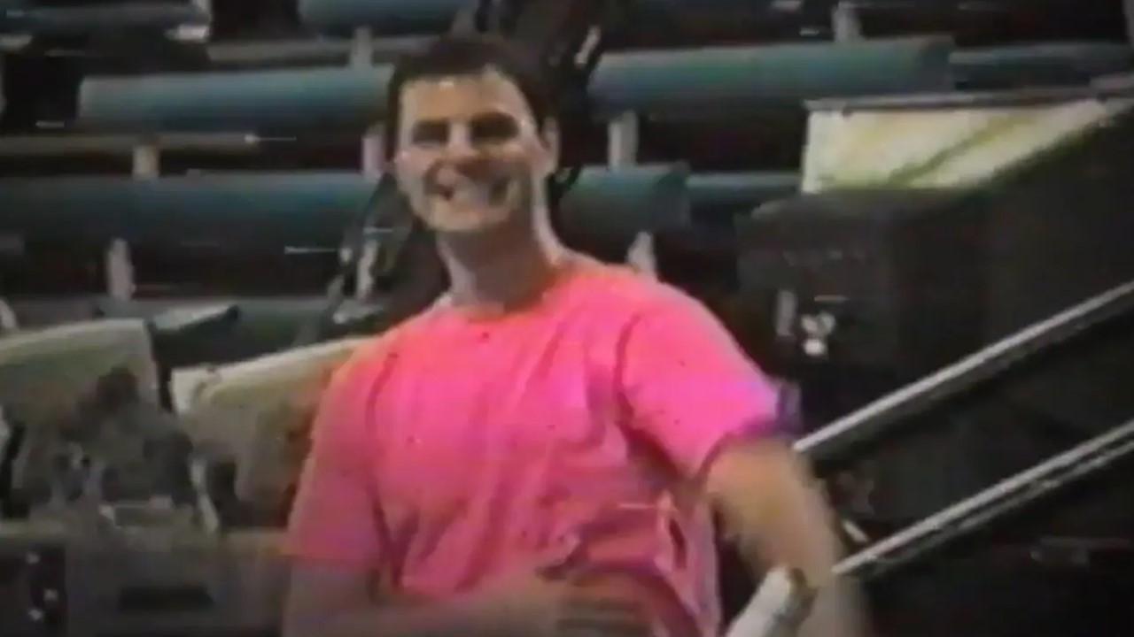 Jason Handy wearing a pink t-shirt