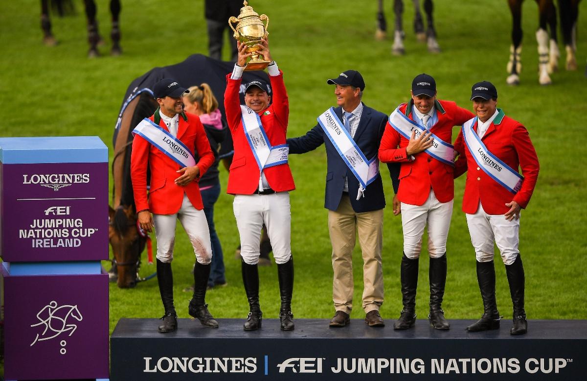 Dublin , Ireland - 10 August 2018; The Mexico team, from left, Eugenio Garza Perez, Enrique Gonzalez, Chef d'Equipe Stanny van Paesschen, Patricio Pasquel and Federico Fernandez celebrate with the Aga Khan Cup following the Longines FEI Jumping Nations Cup of Ireland during the StenaLine Dublin Horse Show at the RDS Arena in Dublin. (Photo By Harry Murphy/Sportsfile via Getty Images)