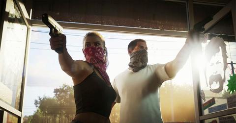 Lucia and her partner holding guns in 'GTA 6.'