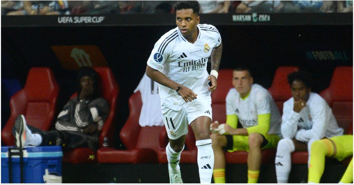 Rodrygo running onto the field