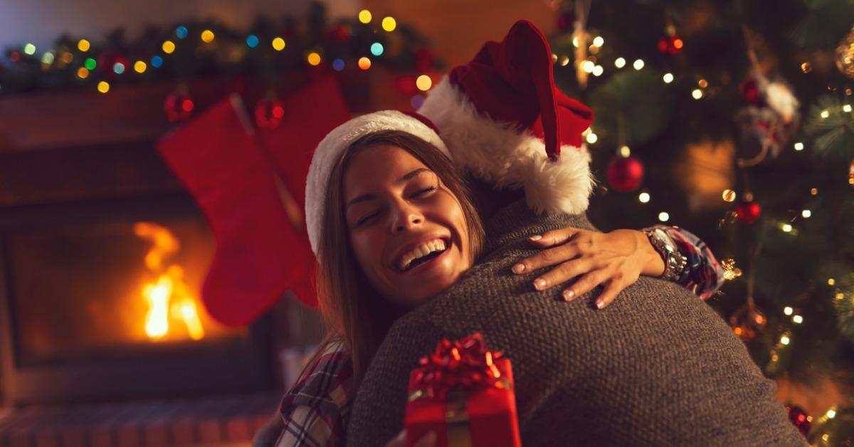 couple exchanging christmas presents picture id