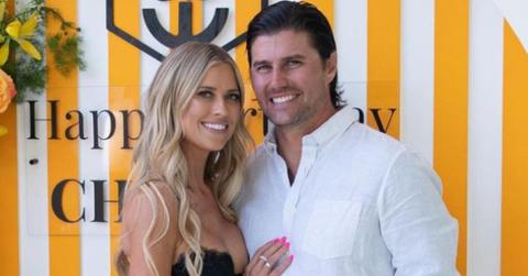 Christina Haack and Josh Hall pose at an event