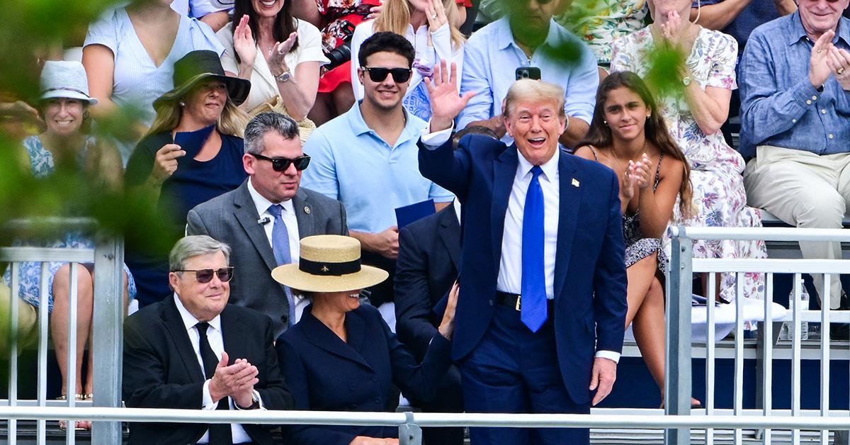 Donald Trump waves at Barron Trump's graduation. 