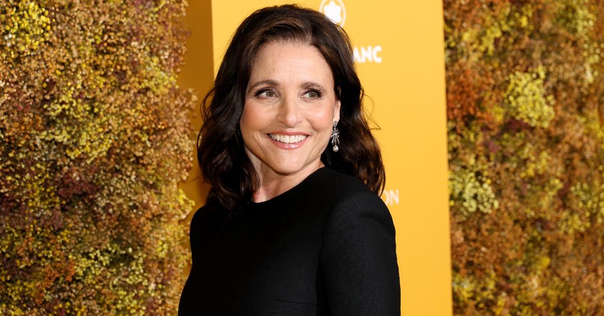 Julia Louis-Dreyfus in black dress against yellow background at WSJ Magazine 2023 Innovator Awards at Museum of Modern Art on November 01, 2023 in New York City. (Photo by Dia Dipasupil/Getty Images)