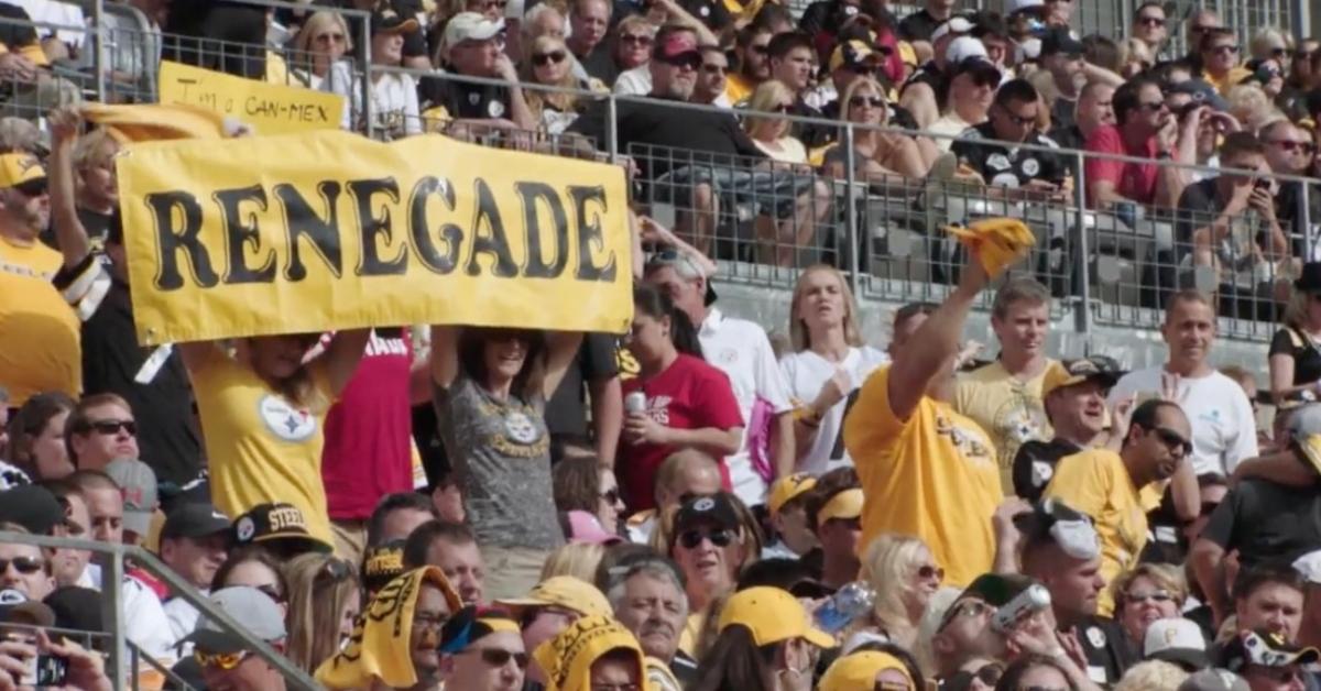 Steelers fans holding a Renegade sign.