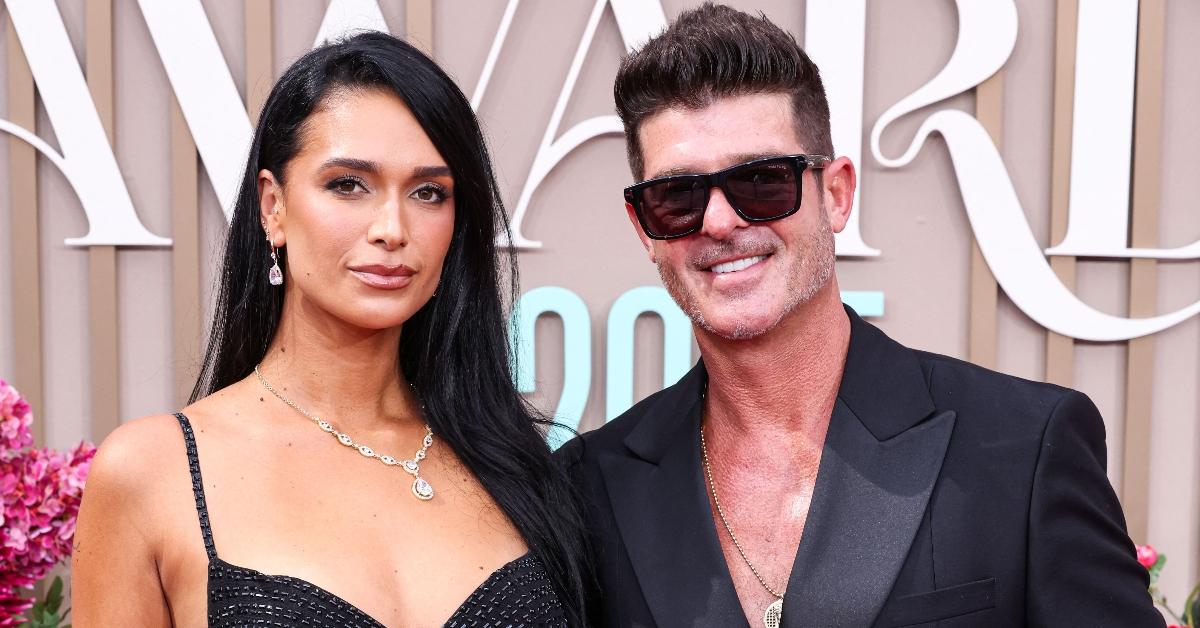 Robin Thicke and April Love Geary